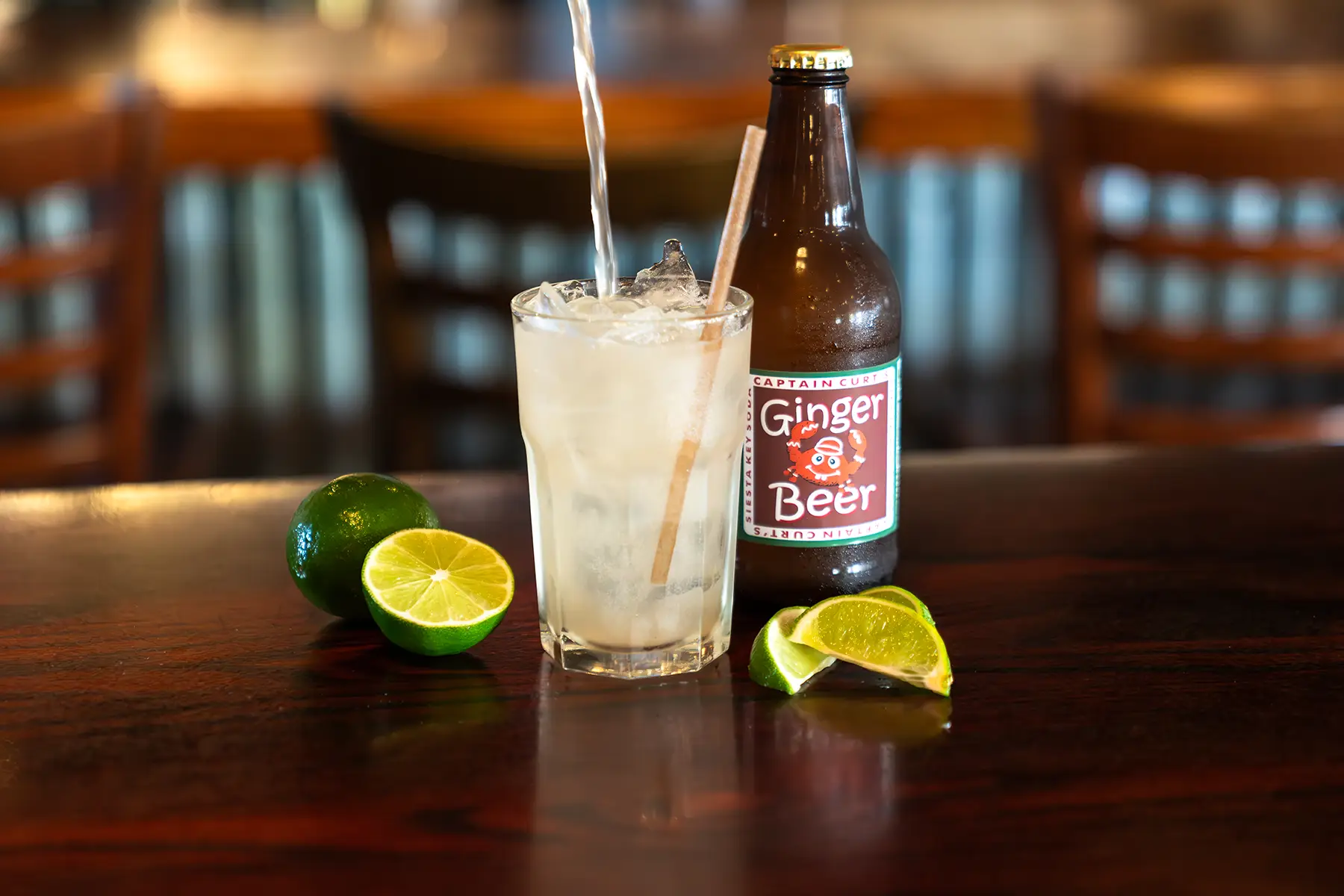 Tropical Cocktail Drink at Sniki Tiki Bar Siesta Key Tropical cocktail with lime and ginger beer served at a bar in Siesta Key Florida