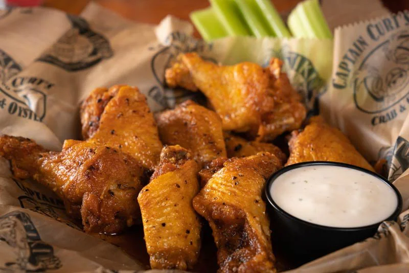 Buffalo Wings at Captain Curt’s Crab & Oyster Bar Buffalo chicken wings served at Captain Curt’s Crab & Oyster Bar in Siesta Key